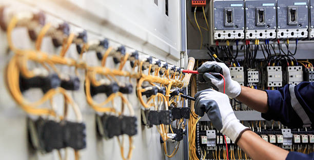 Professional Electrician technician working in Little Cypress, TX
